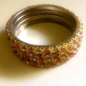 Brand new set of 4 Bangles